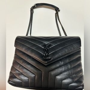YSL BLACK ON BLACK  quilted leather can be worn as a crossbody style